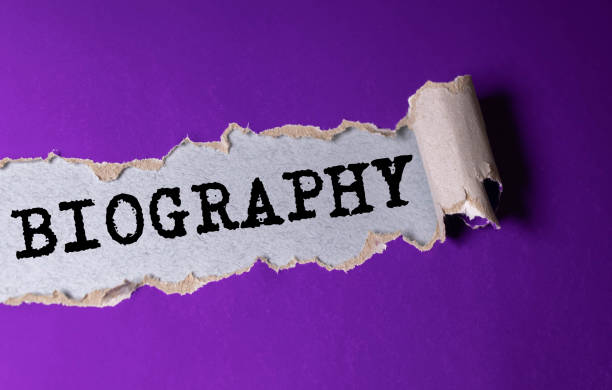 Biography On blackboard with cup of coffee, with glasses on wooden background Biography On blackboard with cup of coffee, with glasses on wooden background